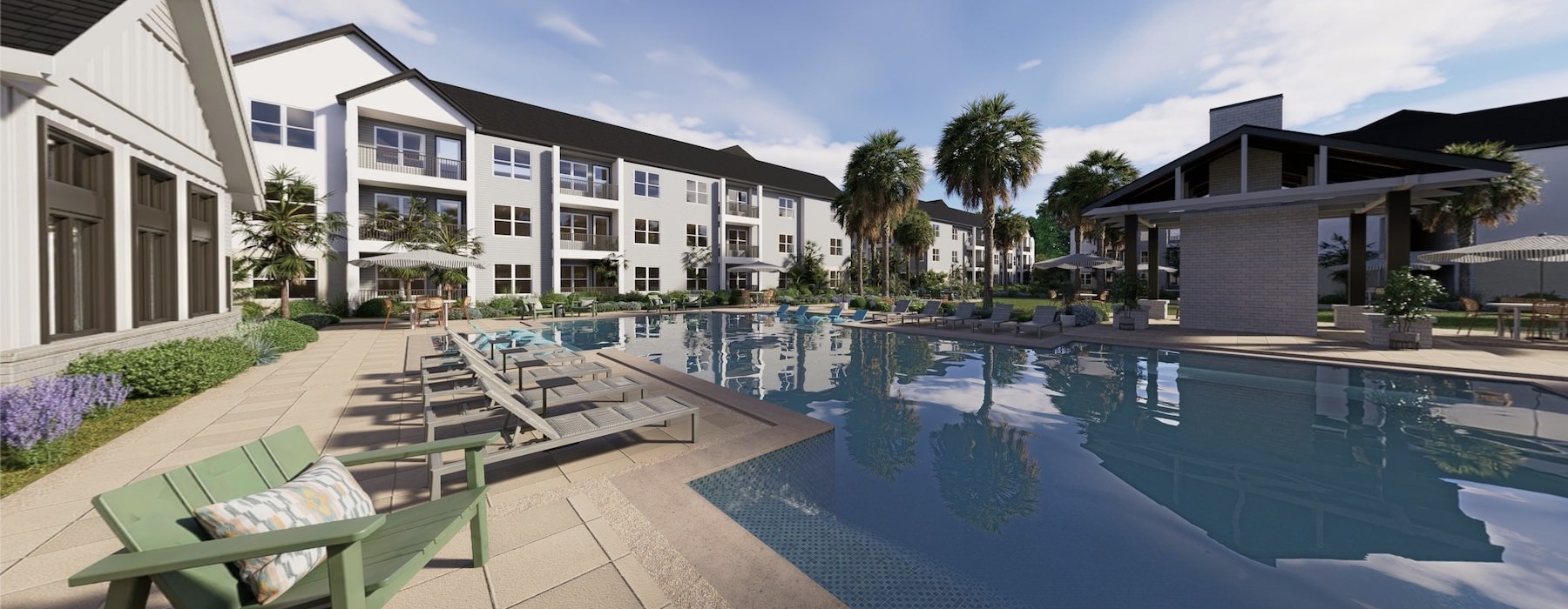 a courtyard with a pool and chairs